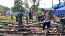 Sambut HUT TNI Ke-77, Satgas Yonif Raider 600/Modang Laksanakan Karya Bakti di Kabupaten Mappi