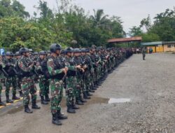 Sambut Kunjungan Kerja Panglima TNI dan Kapolri, Dandim 1710/Mimika Pimpin Apel Gabungan Gelar Pasukan
